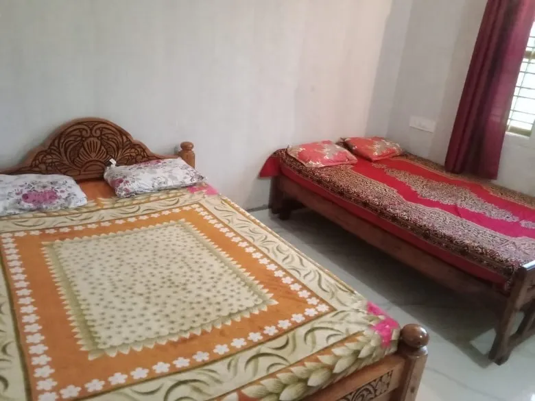 Second bedroom with a double bed and a single bed